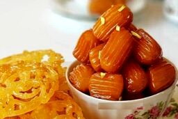 طرز تهیه زولبیا با نشاسته و ماست + فوت و فن ترد شدن زولبیا و بامیه
